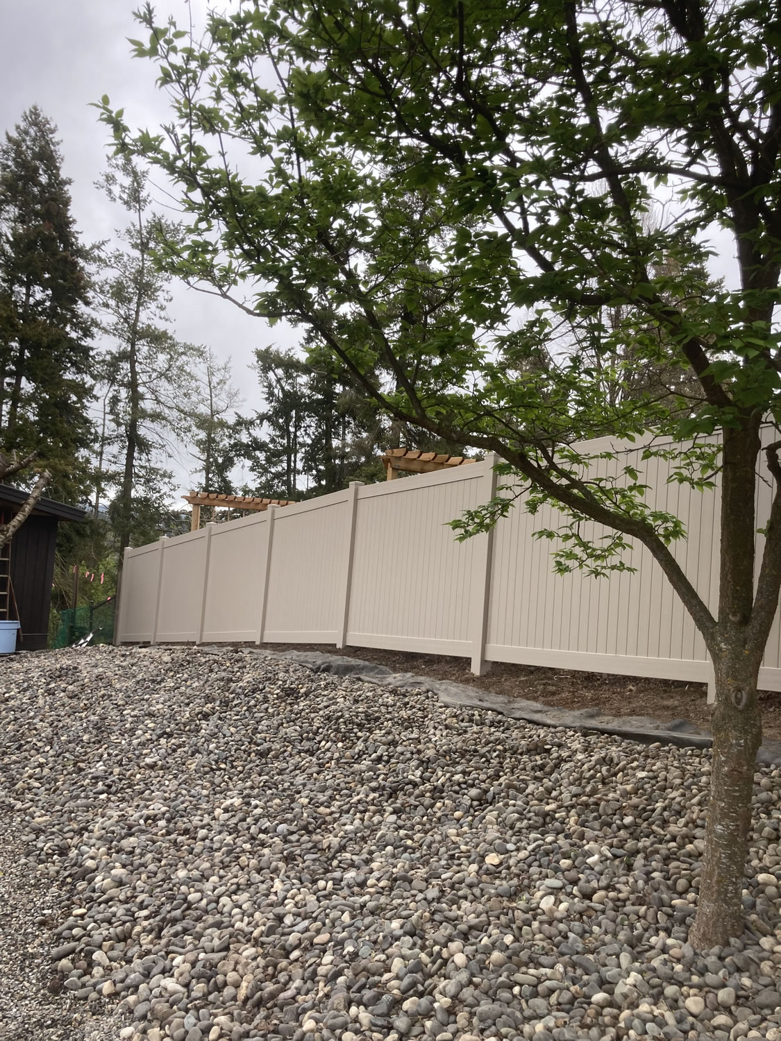 Vinyl fence and landscaping