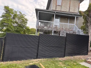 Charcoal corrugated metal fence North Okanagan Vernon BC
