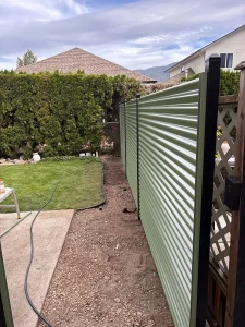 Corrugated metal fence installation Vernon British Columbia