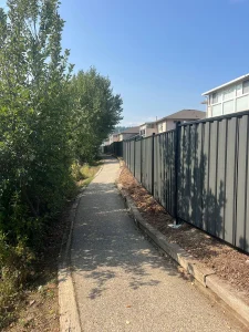 Corrugated metal privacy fence installed in the Okanagan BC